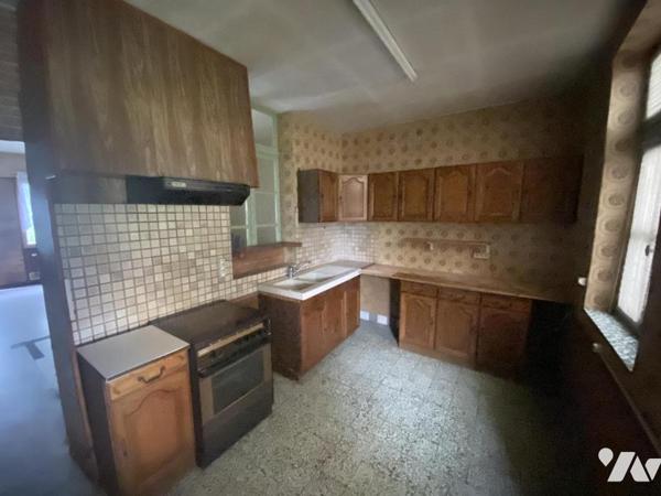 A VILLERS BRETONNEUX Maison Mitoyenne