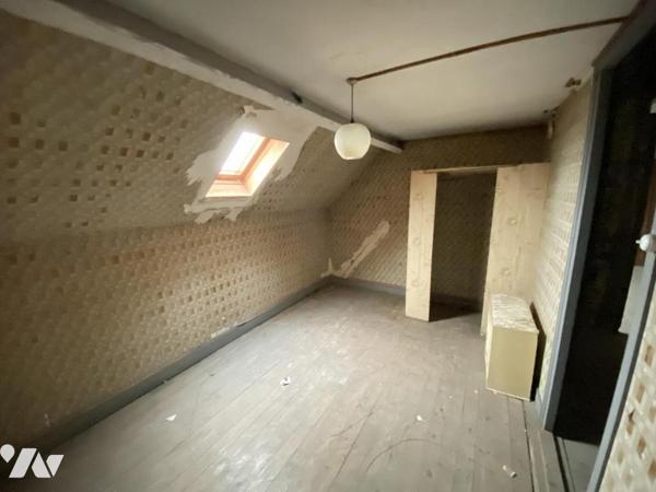 A VILLERS BRETONNEUX Maison Mitoyenne