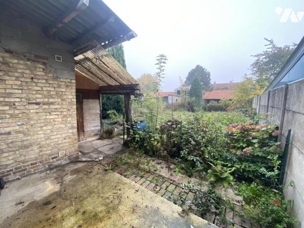 A VILLERS BRETONNEUX Maison Mitoyenne