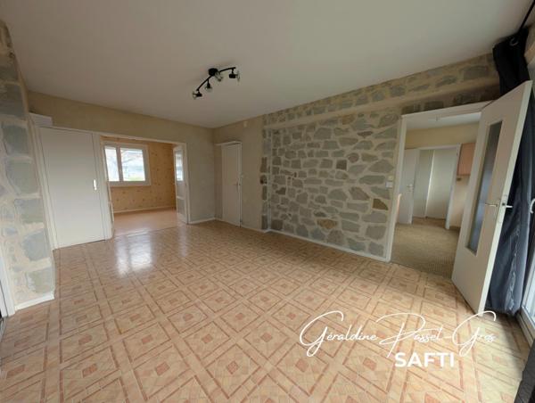 Appartement T4 avec balcons, cave et garage