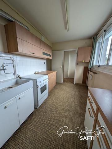 Appartement T4 avec balcons, cave et garage