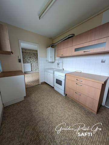 Appartement T4 avec balcons, cave et garage