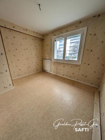 Appartement T4 avec balcons, cave et garage