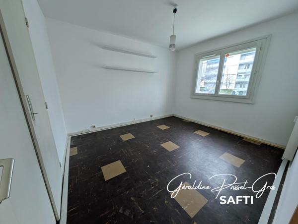 Appartement T4 avec balcons, cave et garage