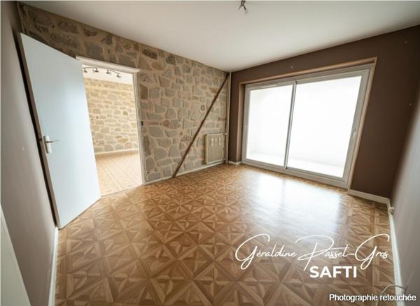 Appartement T4 avec balcons, cave et garage