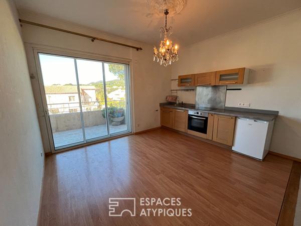 Appartement avec toit terrasse à réinventer