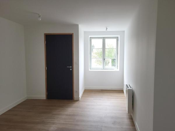 SPACIEUX - TOTALEMENT NEUF... AVEC 2 CHAMBRES - GARAGE - TERRASSE