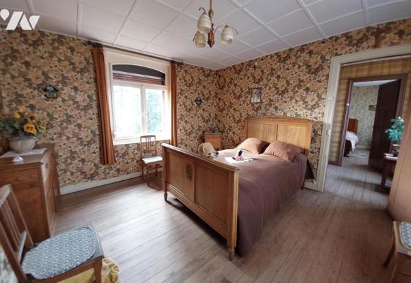 Maison de ville avec 3 chambres garage et grand jardin.