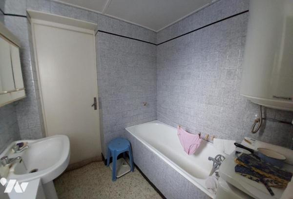 Maison de ville avec 3 chambres garage et grand jardin.