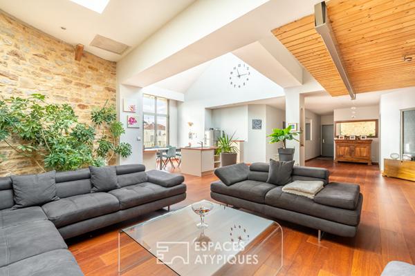 Appartement duplex chargé d’histoire, entre charme et volumes exceptionnels