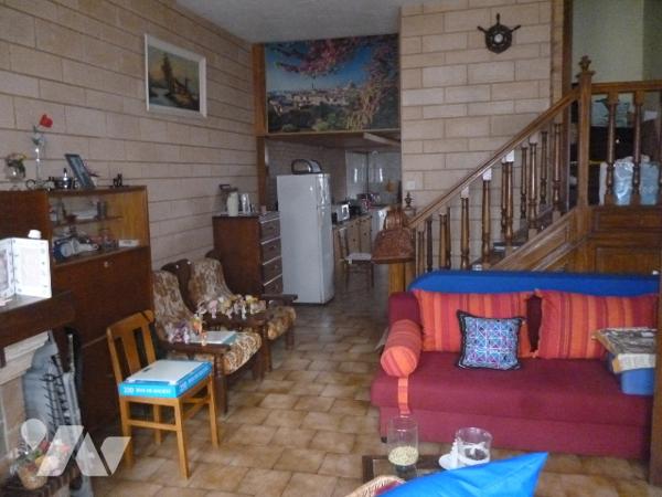 Maison d'habitation briques et ardoises,  6 pièces, grenier, garage, dépendance, terrain.