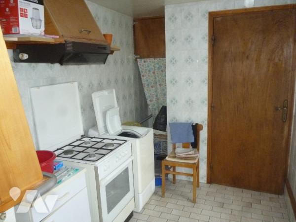 Maison d'habitation briques et ardoises,  6 pièces, grenier, garage, dépendance, terrain.