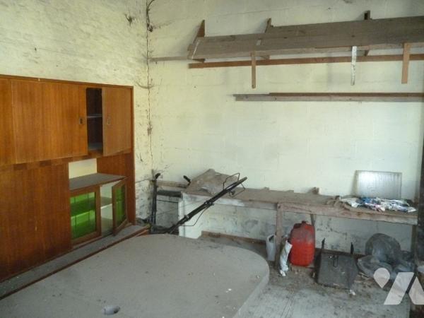 Maison d'habitation briques et ardoises,  6 pièces, grenier, garage, dépendance, terrain.