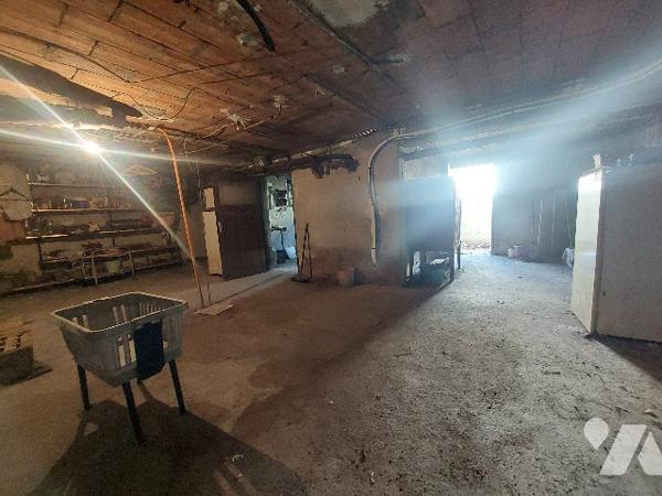 SAINT-GAUDENS, ensemble immobilier composé d'une habitation principale et de nombreuses dépendances.