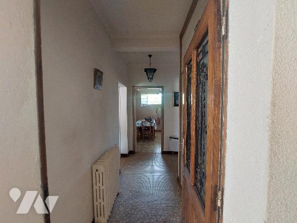 SAINT-GAUDENS, ensemble immobilier composé d'une habitation principale et de nombreuses dépendances.