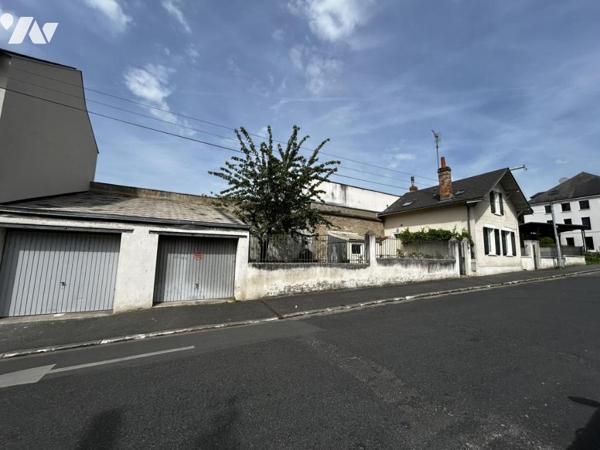 harmante maison avec jardin, dépendance et deux garages –