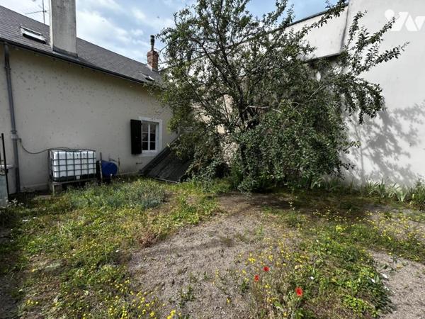 harmante maison avec jardin, dépendance et deux garages –