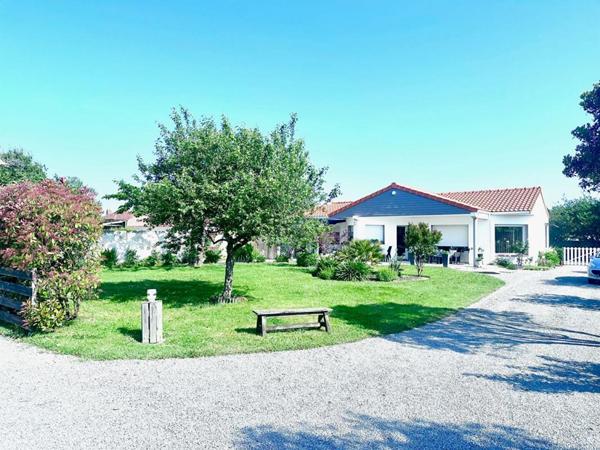 Propriété au calme et proche commerces