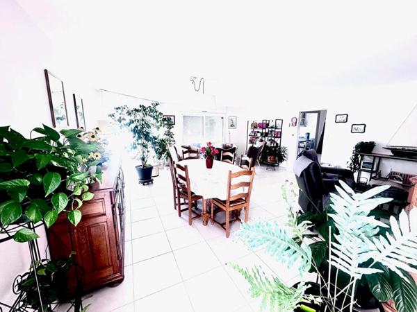 Propriété au calme et proche commerces