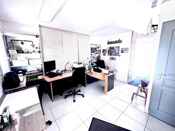 Propriété au calme et proche commerces