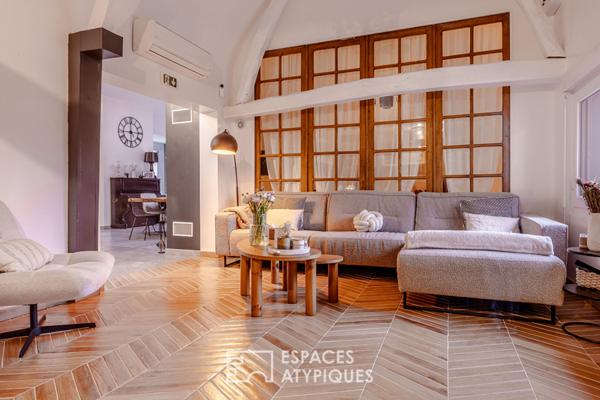 Loft de caractère dans une ancienne salle des fêtes, à deux pas de la ville
