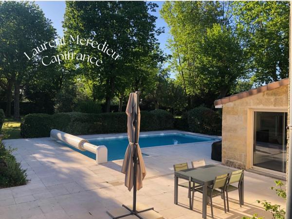 Magnifique demeure en pierre avec grand jardin, piscine & espace professionnel