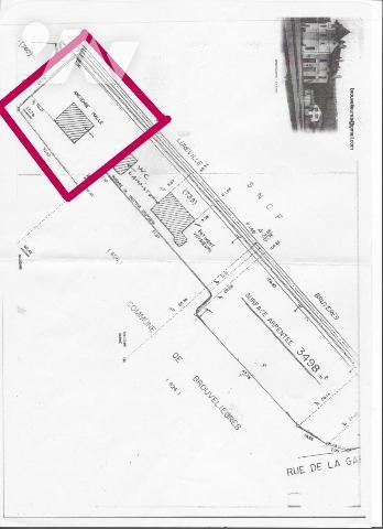 Entrepôt avec terrain constructible 