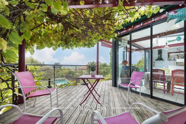 Maison T6 avec jardin et piscine