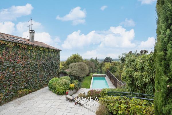 Maison T6 avec jardin et piscine