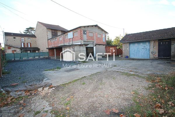 Centre-ville : Garages avec cour et dépendance