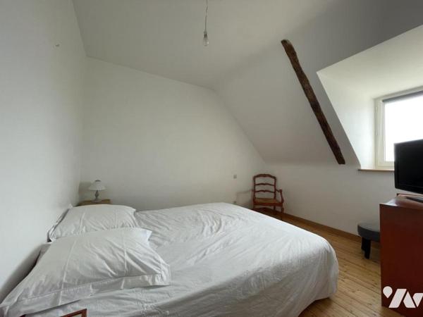 Ensemble de maisons d'habitations avec jardin