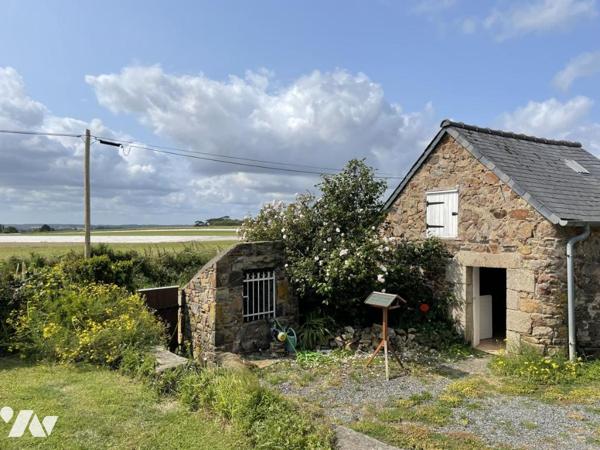 Ensemble de maisons d'habitations avec jardin