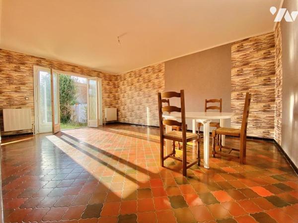 Maison de type P4 avec jardin et garage, au calme