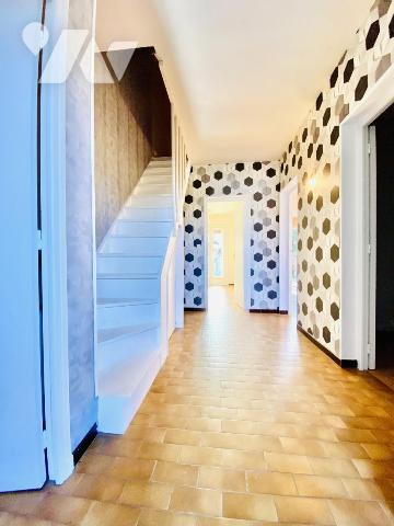 Maison de type P4 avec jardin et garage, au calme