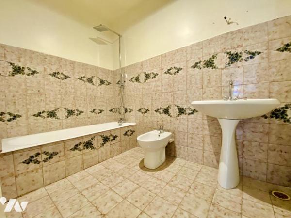 Maison de type P4 avec jardin et garage, au calme