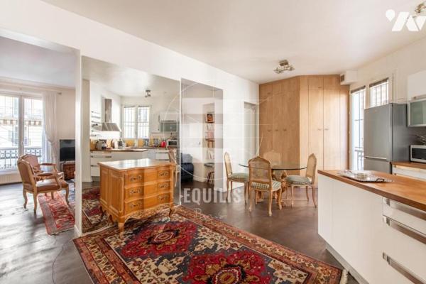 Appartement traversant de 98 m² – 2 chambres – Charme de l’ancien – Rue La fayette