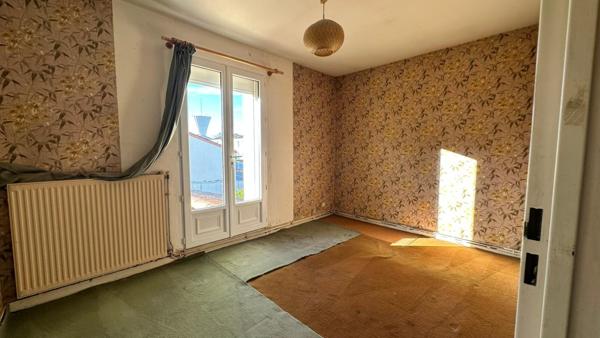 Maison familiale avec jardin et potentiel locatif