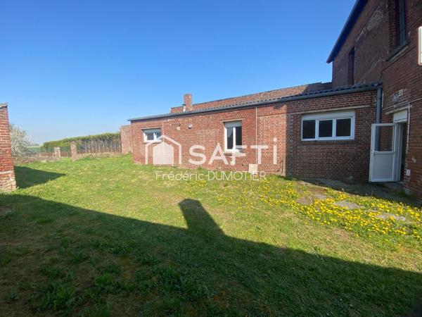 Maison avec de beaux volumes et 4 chambres