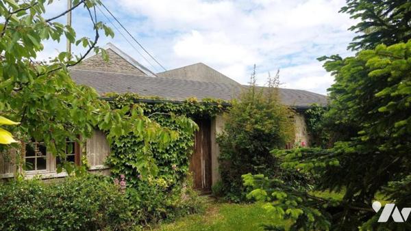 Grand pavillon avec autonomie de plain-pied implanté sur 1.204 m² à proximité du bourg de BARFLEUR