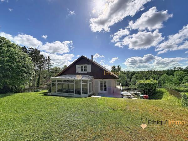 Coup de cœur assuré ! Maison familiale de 161 m² avec véranda chauffée et terrain arboré de 2 800 m²