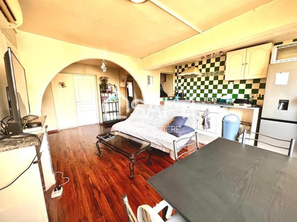 T3 coeur de ville, cour privative.