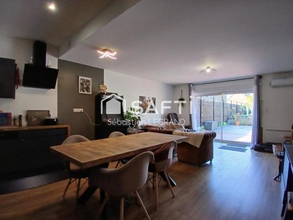Appartement 3 chambres avec jardin, cave et parkings