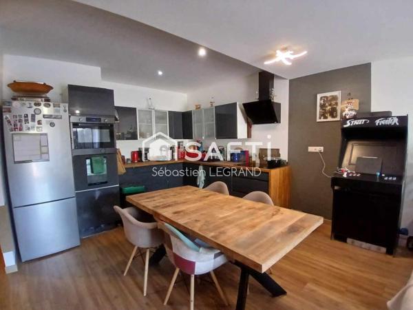 Appartement 3 chambres avec jardin, cave et parkings