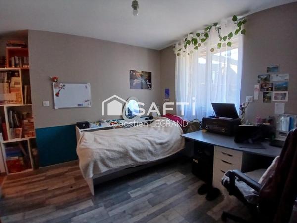 Appartement 3 chambres avec jardin, cave et parkings