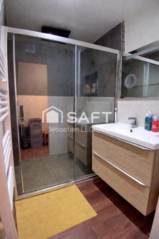 Appartement 3 chambres avec jardin, cave et parkings