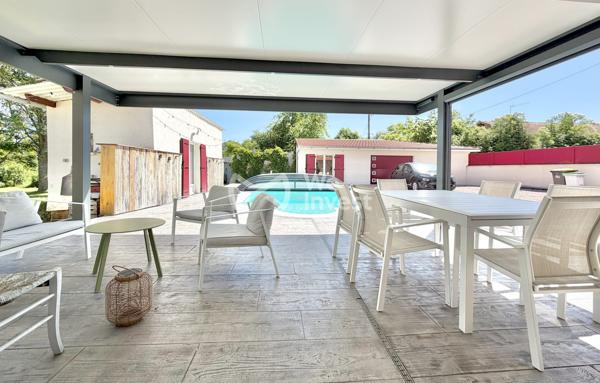 Maison avec cachet de type 5 de 113 m² habitables, garage, piscine et jardin.