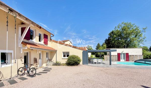 Maison avec cachet de type 5 de 113 m² habitables, garage, piscine et jardin.