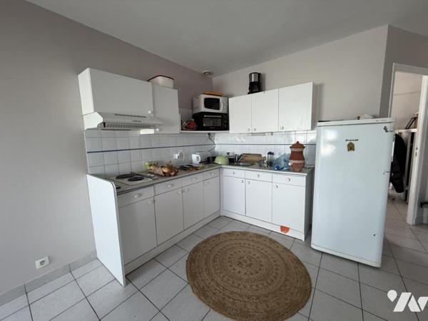 Centre-ville de Savenay – Immeuble avec local commercial et 3 appartements 