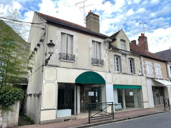 Immeuble avec local commercial