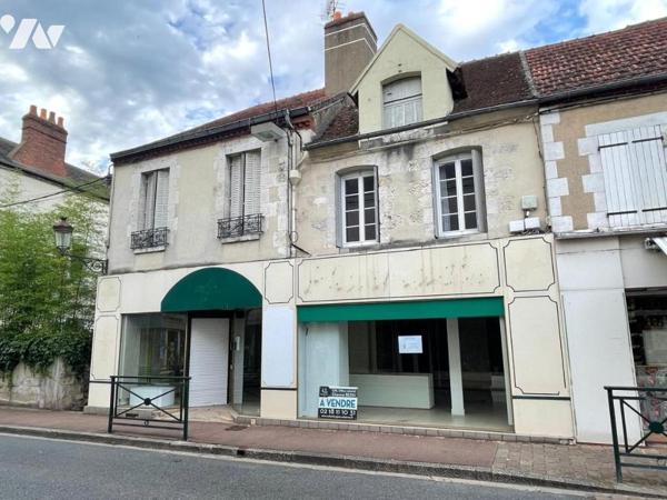 Immeuble avec local commercial